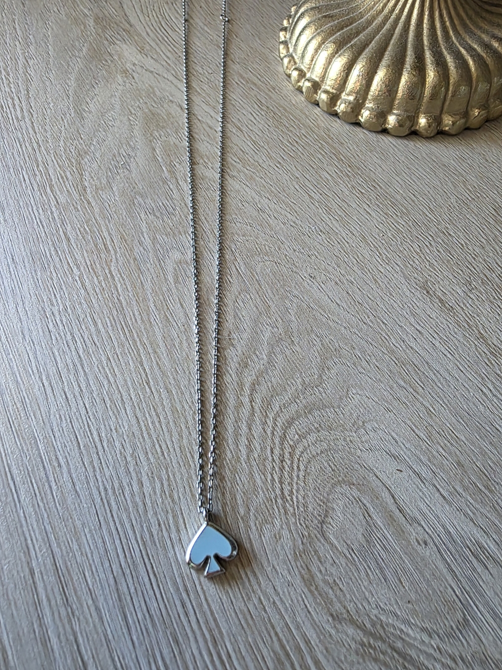 Kate Spade Silver And Blue Spade Pendant